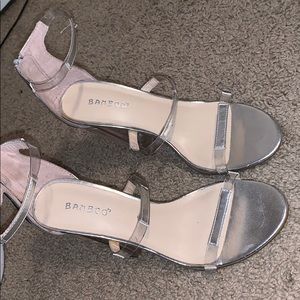 Clear and silver high heels
